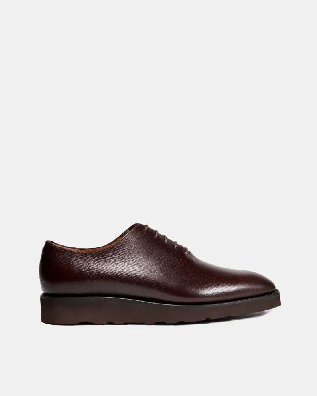 Men's Oxford shoes with a decorative inlay on the toeDark Brown Wholecut Oxford Lightweight Shoe